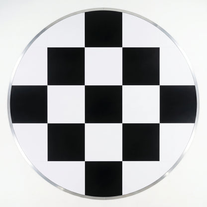 A circular dance floor a black and white checkerboard pattern with a polished silver metallic rim for weddings &amp; events 