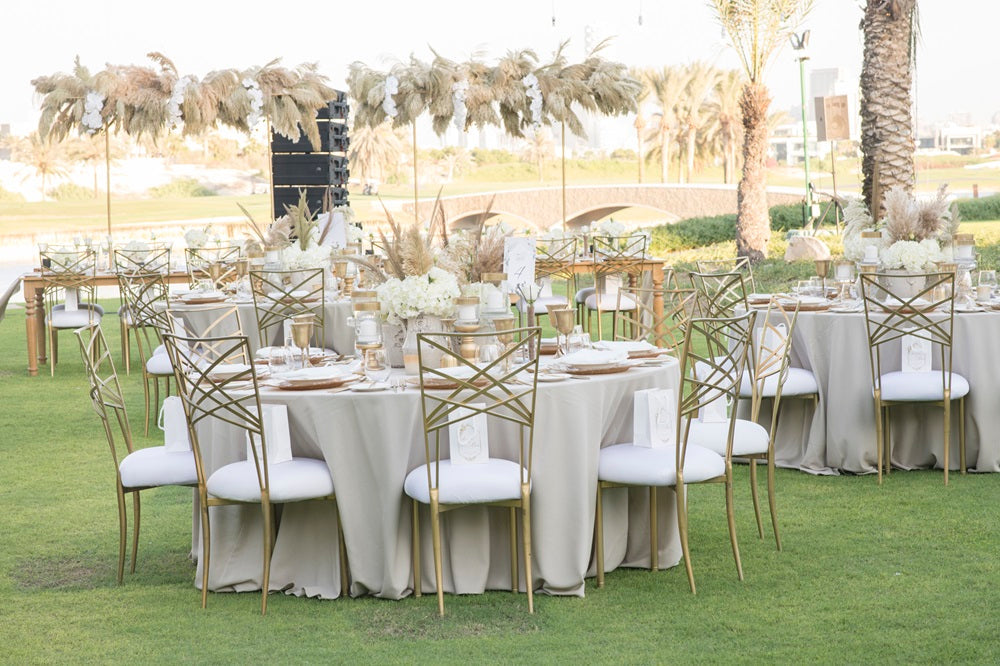 Round Banquet Tables set for a wedding reception, suitable for seating 6-8, commonly used in Dubai hotels and ballrooms.