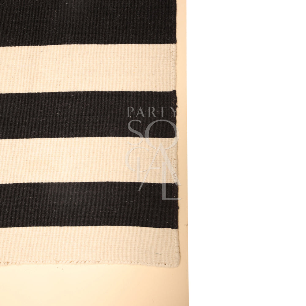 RUG BLACK AND WHITE STRIPES, ideal for enhancing event settings, featuring a bold striped pattern, measuring 220cm by 160cm, perfect for versatile party decor.