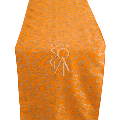 Brocade Table Runner with gold pattern, ideal for elegant event settings.