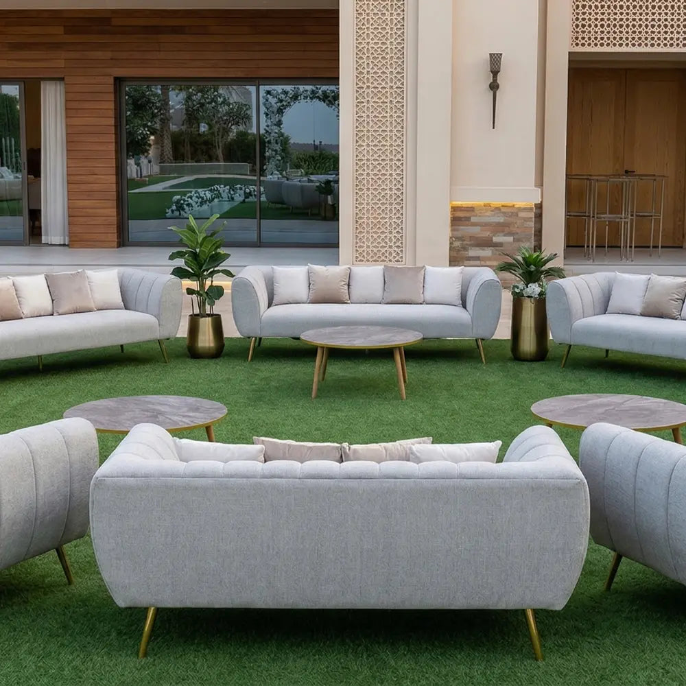 SAND TEXTURED SOFA 3-SEATER in a modern outdoor lounge setup, perfect for creating a refined ambiance at events or private lounges.