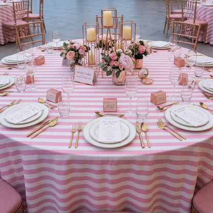 SMALL STRIPES ROUND TABLECLOTH elegantly decorates a formal banquet table with pink-and-white stripes, enhancing the birthday celebration&