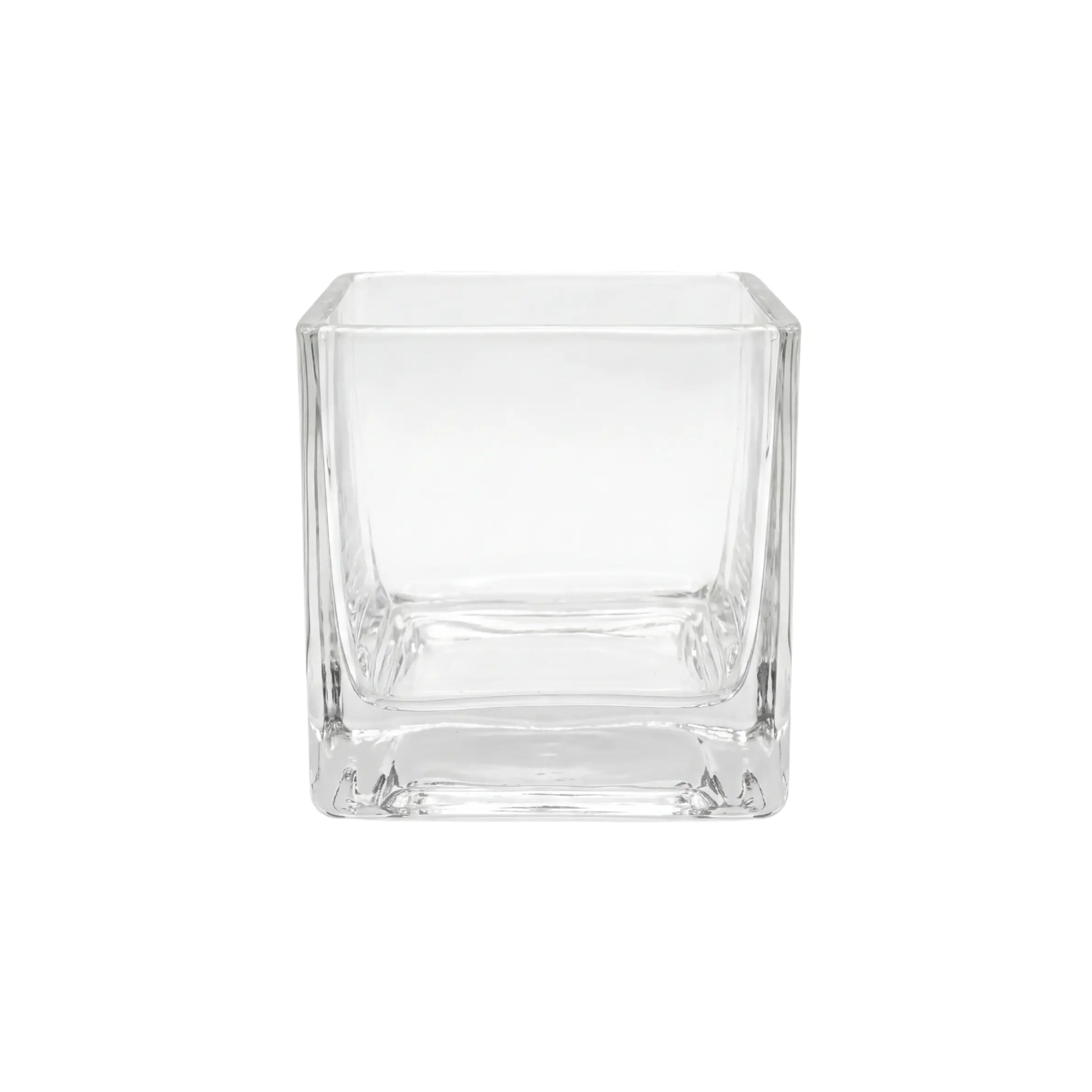 SQUARE TEA LIGHT CANDLE HOLDER: A clear glass cube ideal for enhancing event decor, adding elegance and warm ambiance to special occasions. Candles sold separately.