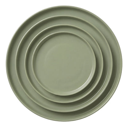 Sage Ceramic Collection: Overhead view of four nested olive-green plates, ranging from charger to B&amp;B size, showcasing elegant settings for any event.