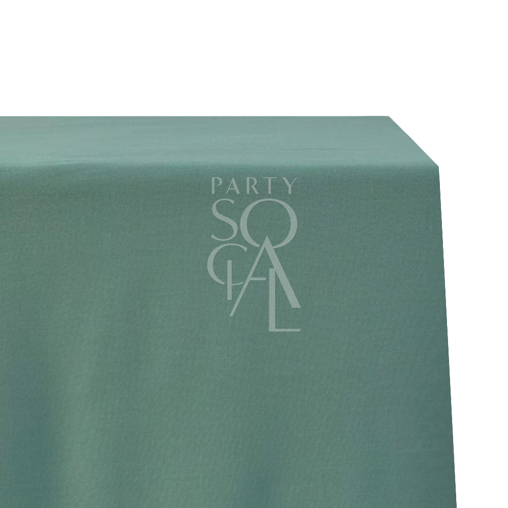 Rectangular tablecloth made from premium cotton linen, featuring a subtle logo. Ideal for enhancing special occasions with an elegant touch.