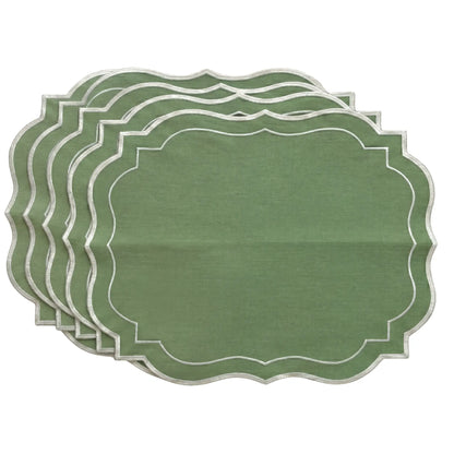 Sage Green Scalloped Linen Placemats - Set of 4, showcasing scalloped edges with white embroidery, stacked to reveal their elegant design for sophisticated table settings.