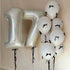 Signature Letter Balloon Bouquet featuring a silver 17 and white balloons with black bows, tied with black ribbons, ideal for celebratory events.