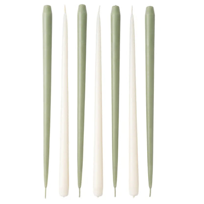 Six taper candles arranged vertically in a row on a plain white background, alternating between sage green and off-white.