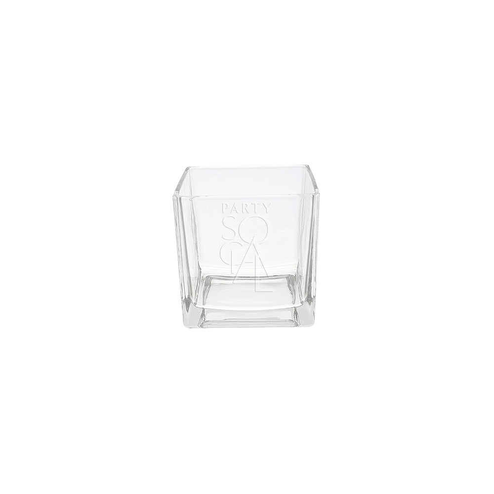 SQUARE TEA LIGHT CANDLE HOLDER: A clear square glass holder, ideal for tea lights, displaying a minimalistic design suitable for events and parties.