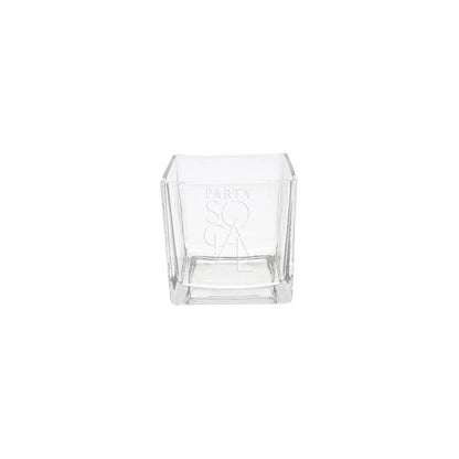 SQUARE TEA LIGHT CANDLE HOLDER: A clear square glass holder, ideal for tea lights, displaying a minimalistic design suitable for events and parties.