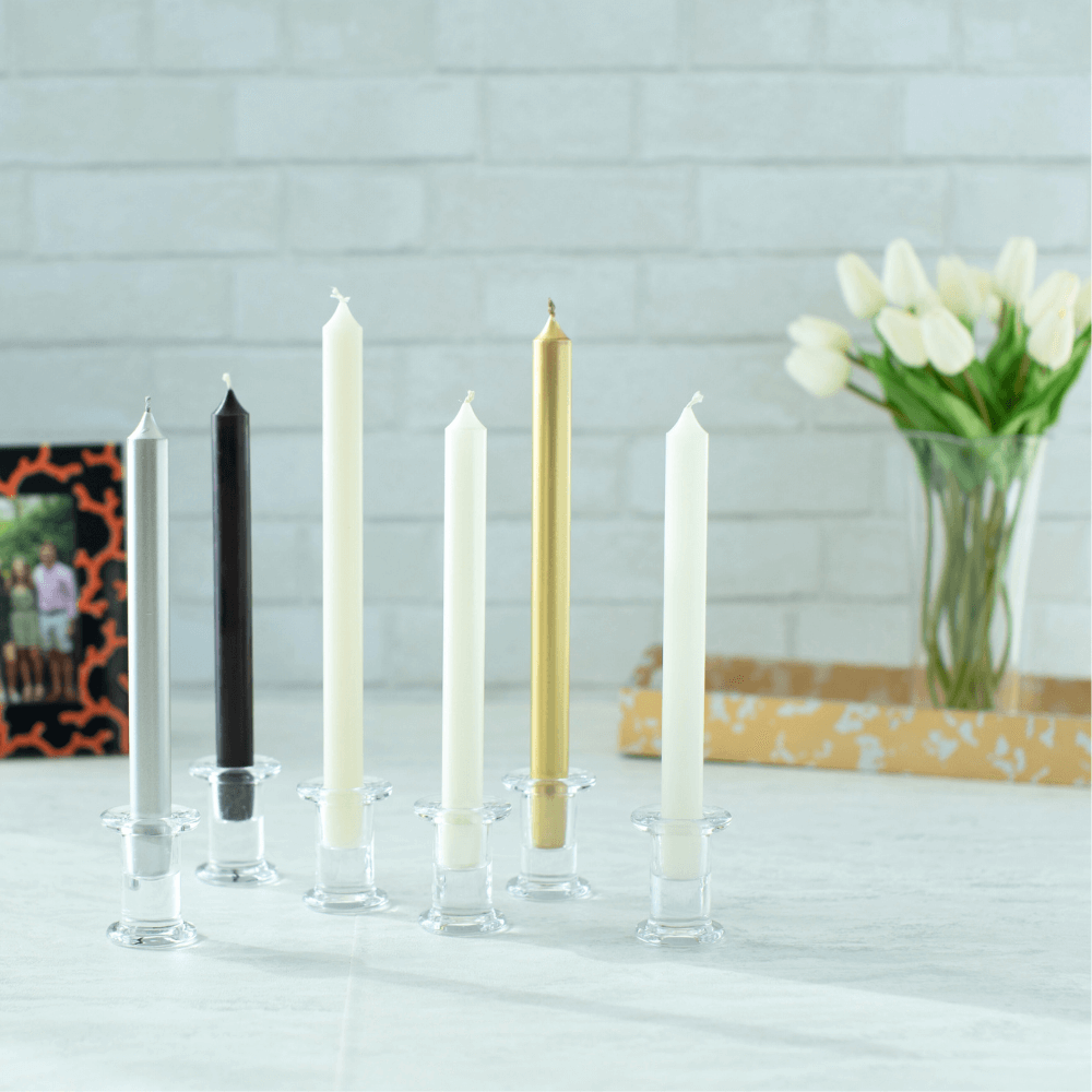 Two elegant 10-inch Duet Crown Candles in holders, ideal for parties and events. Paraffin and palm wax blend with a clean-burning cotton wick. Perfect for adding warmth and charm to any table setting.