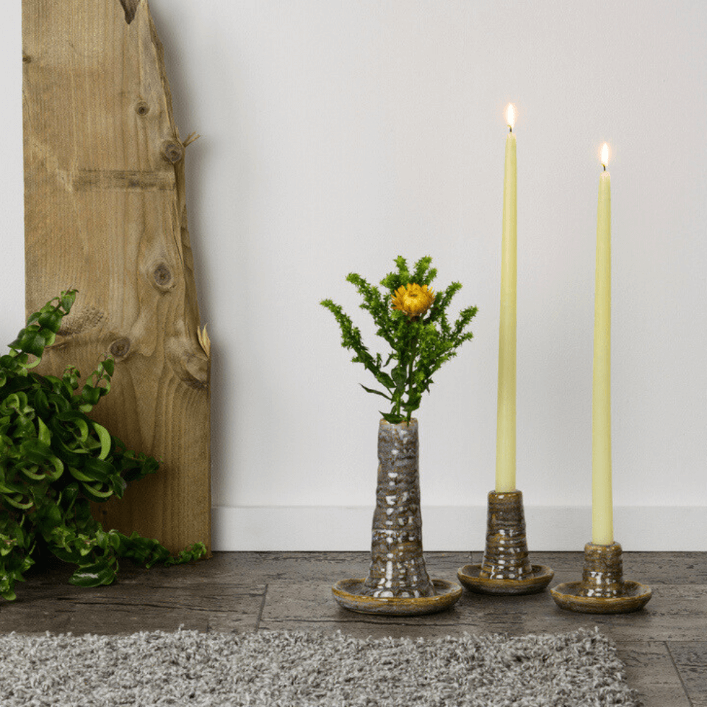 Tapered Smokeless Candles, 40cm, in a vase with a flower, adding warmth to any event. Artisan-made in Belgium, these elegant candles come in various colors, sold in sets of 2.