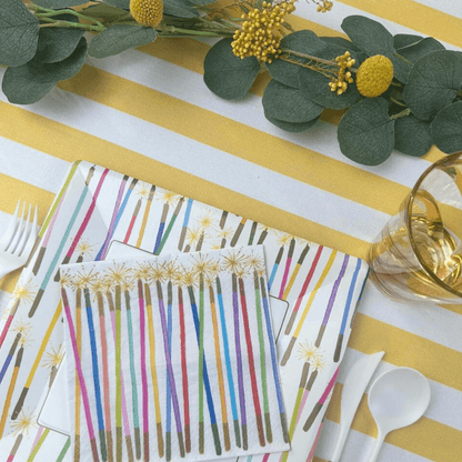 Caspari Party Candles Paper Luncheon Napkins - 20 Per Package. Triple-ply napkins with various designs: fireworks, stripes, and floral motifs. Elevate your table setting with eco-friendly style.