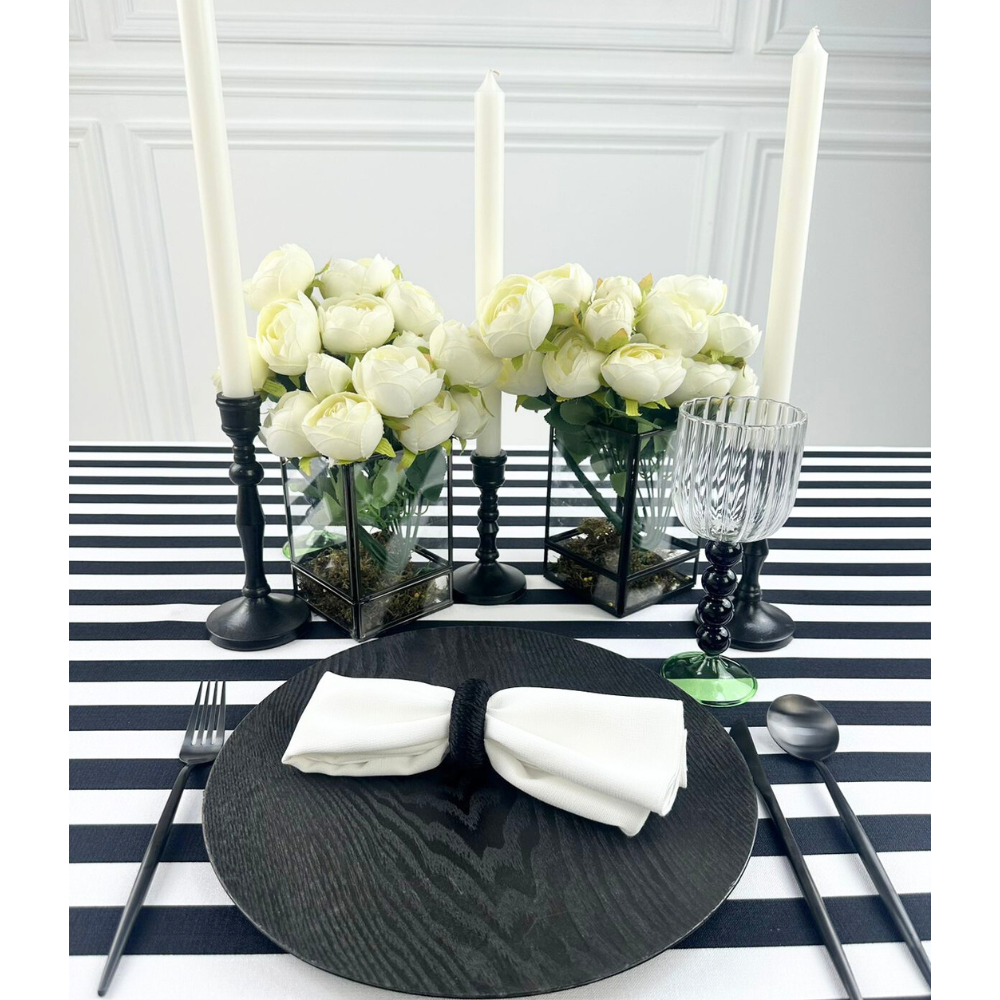 Simple Plastic Wooden-Like Charger Plate with white napkin and white roses on black and white striped tablecloth, perfect for elegant event settings.
