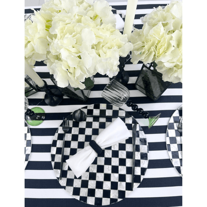 Alt text: Four Ball Stemmed Glass on a checkered table with plates, cutlery, and a vase of white flowers, perfect for any themed event or dinner party.