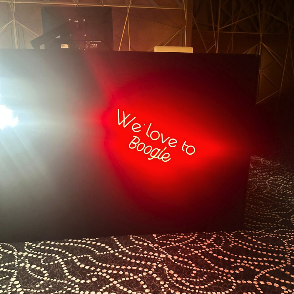 We Love To Boogie-LED Neon Sign, perfect for enhancing party atmospheres with vibrant light; requires electric connection for use.