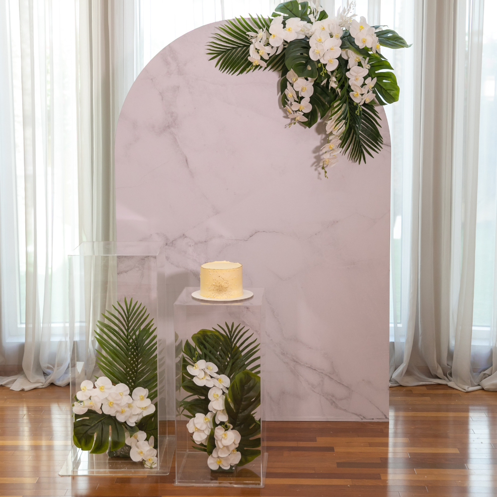 Marble &amp; Greens Backdrop featuring white flowers and green leaves, perfect for enhancing event decor with a natural, elegant touch.