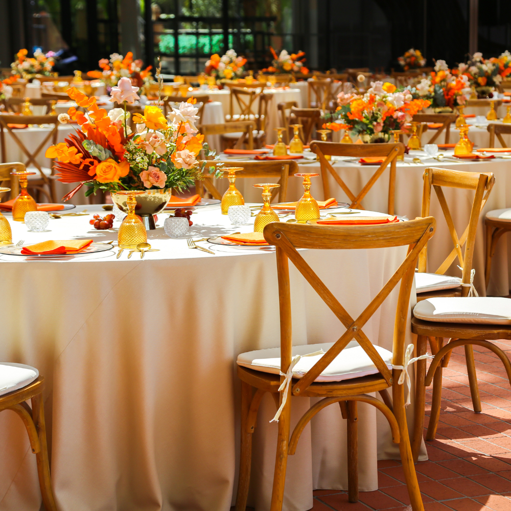 Round tablecloth linen blend on a party table, styled for a special occasion with elegant tableware and glassware, embodying Party Social&