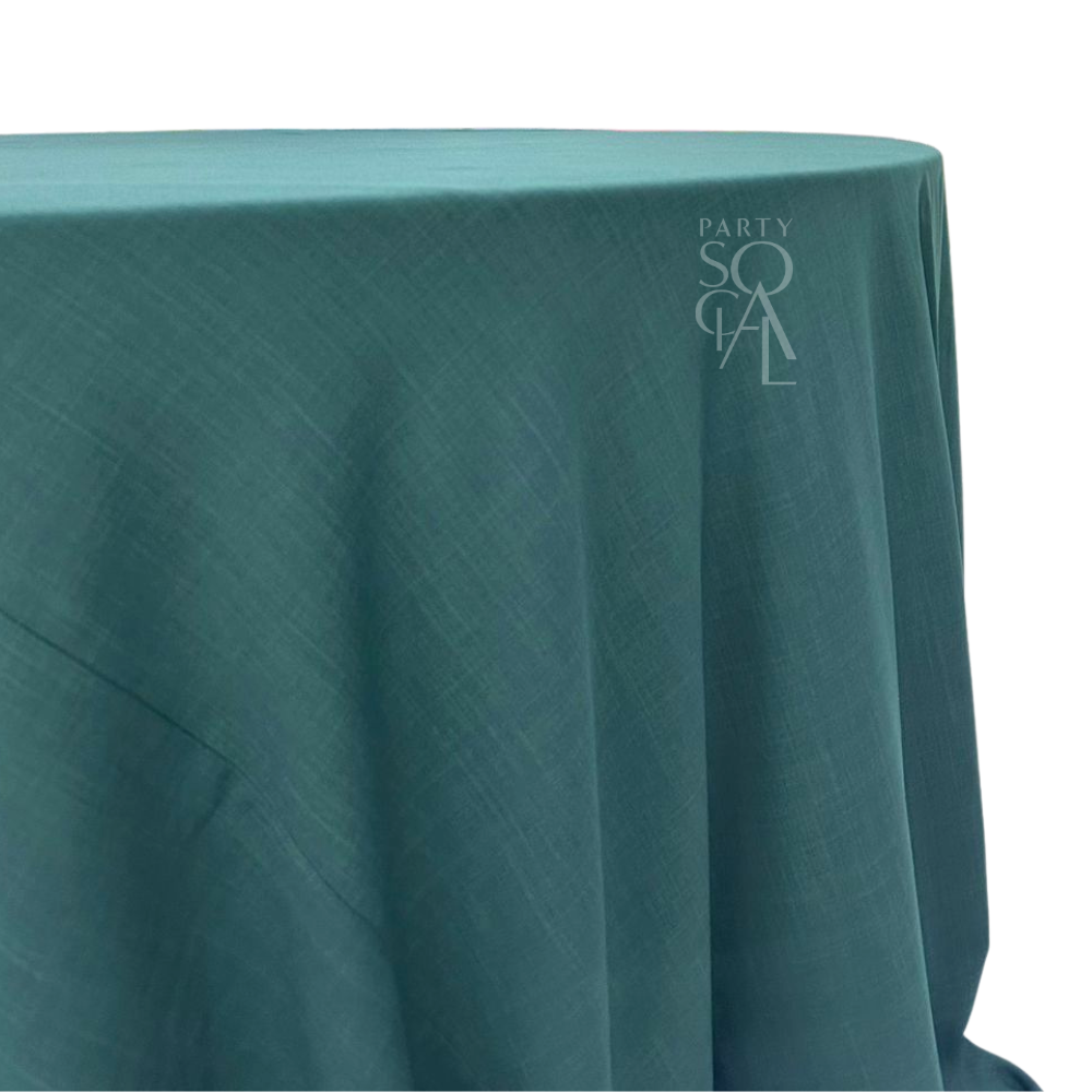 ROUND TABLECLOTH COTTON LINEN on a table, ideal for special occasions, showcased by Party Social.