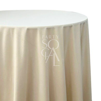 Round tablecloth velvet, shown draped over a round table, ideal for special occasions, reflecting Party Social&