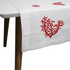 Red Coral Pure Linen Runner on a white table, featuring a red heart design, perfect for elegant table setups.