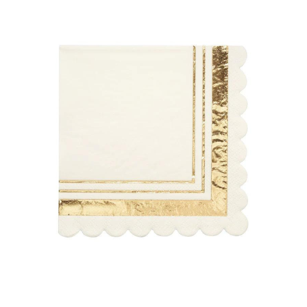 Lotus Paper Cocktail Napkins with gold trim, 20 per package, adding elegance to any party setup.