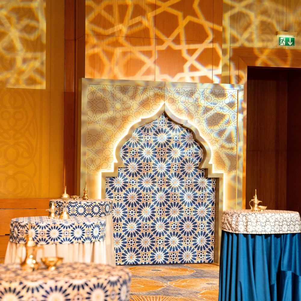 Arabic Style Arch with LED Lights in a room, featuring tables and patterned wall, ideal for event decor.