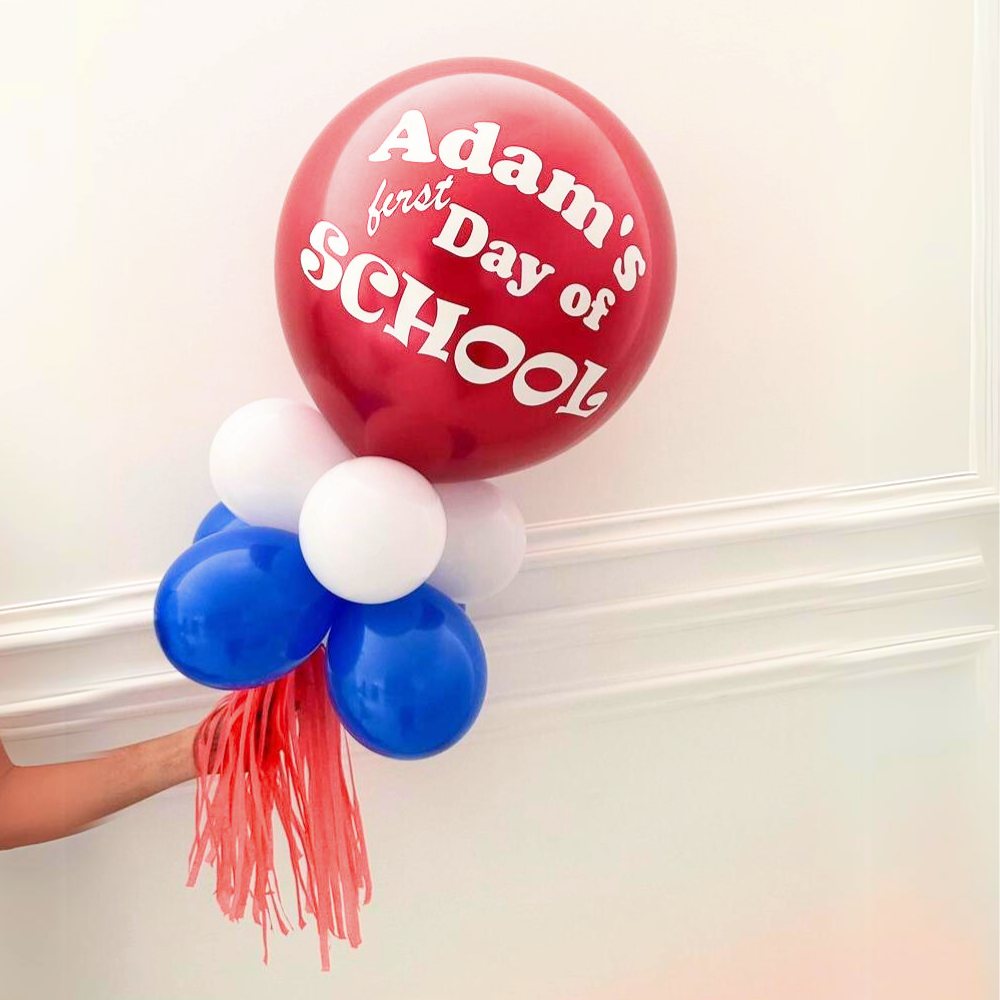 Personalised Back to School Balloon Wand - Metallic: An 18-inch balloon wand with custom message, surrounded by smaller coordinating balloons, perfect for creating memorable back-to-school photos.