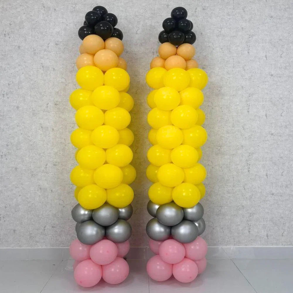 Pencil Balloon Pillars set of 2, perfect for Back to School events, displayed as colorful balloon sculptures resembling pencils.