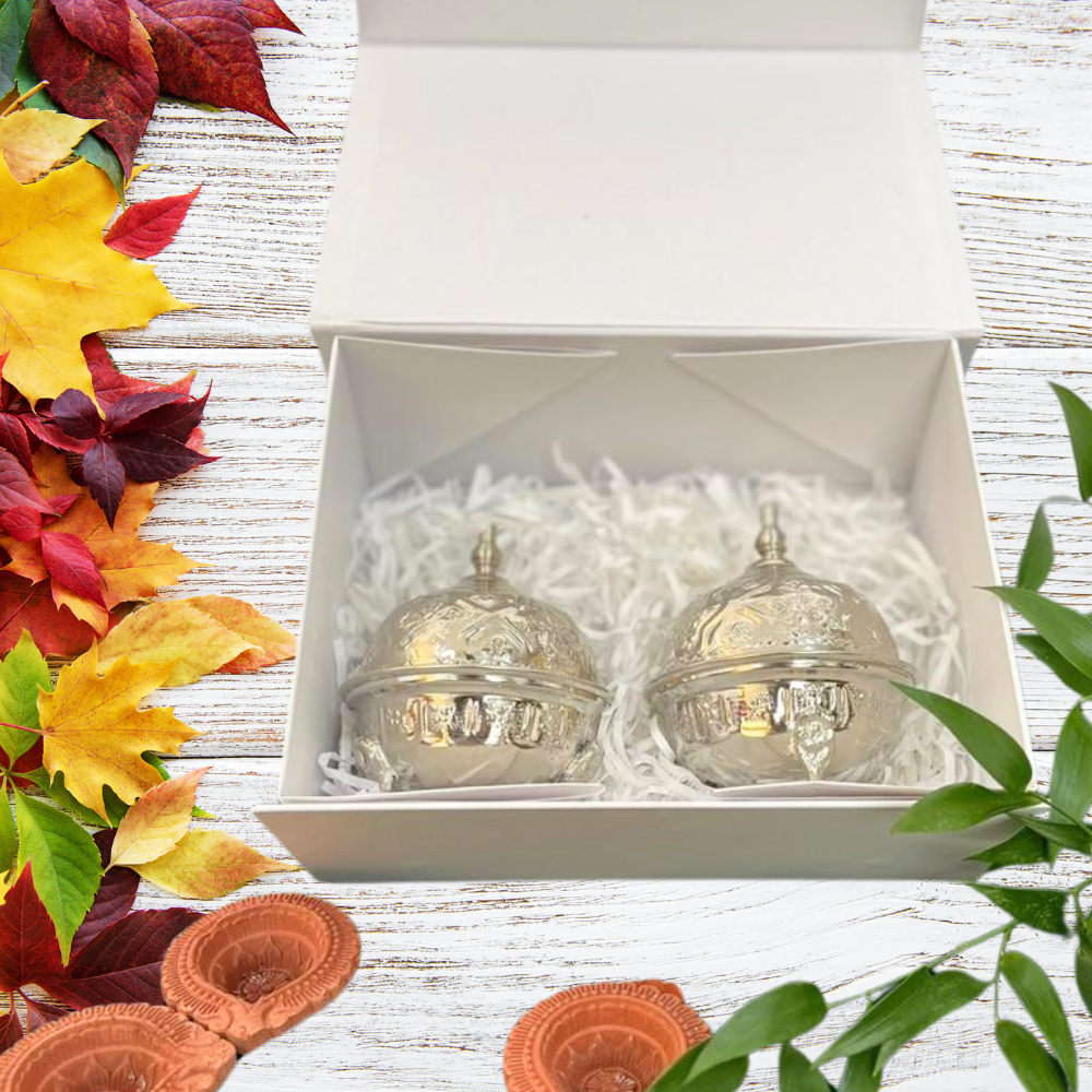 Diwali Thali Gift Box-Small featuring two silver Moroccan-Mini Bowls nestled in a decorative box with floral accents, ideal for festive gifting.