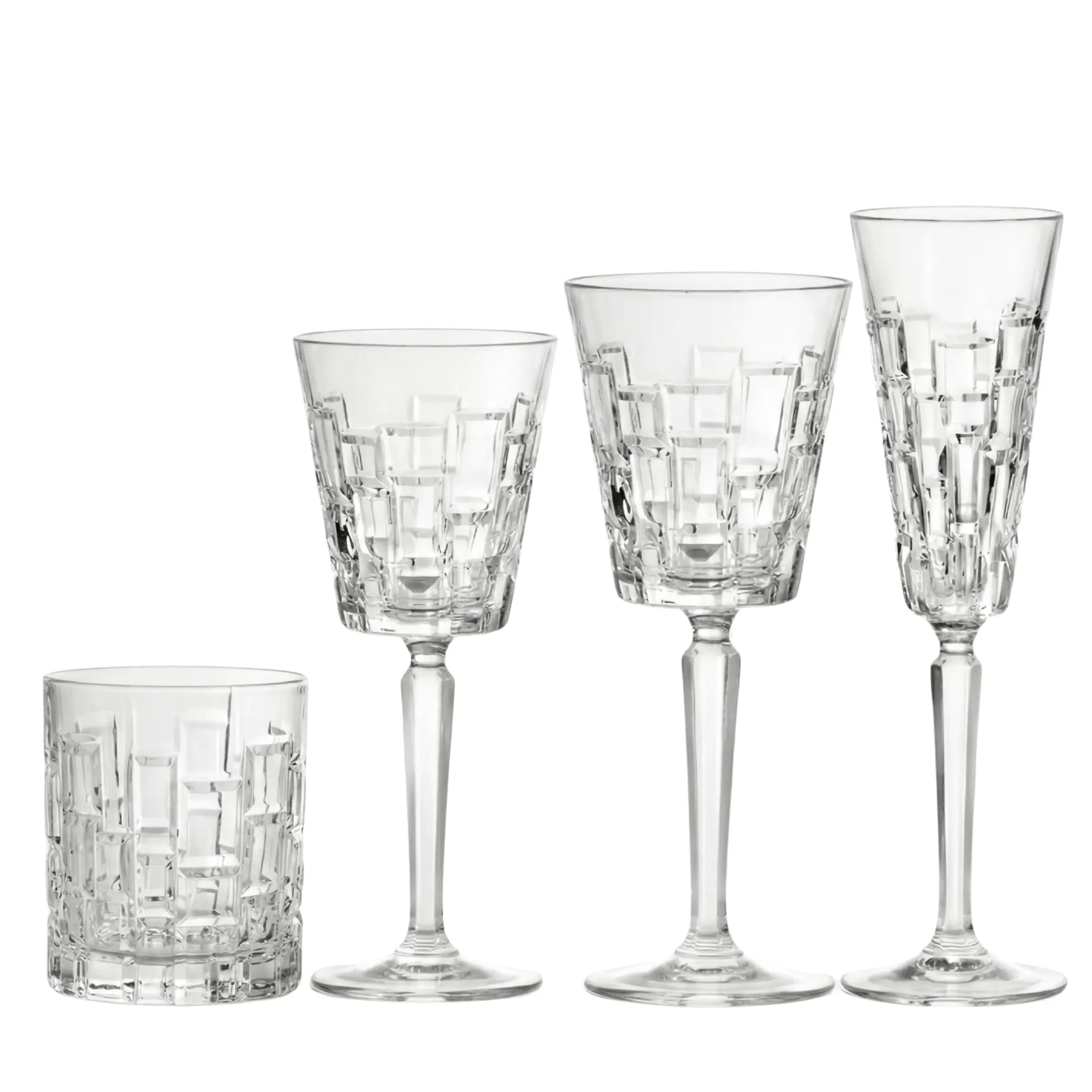 Crystal Mykonos Glassware Collection: Four clear cut-glass vessels with geometric patterns, perfect for elegant events and upscale celebrations, including tumbler, wine glasses, and champagne flute.