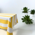Yellow Stripe Linen Tablecloth elevates your table setting with a premium touch. Perfect for events, this polyester tablecloth is easy to wash and reuse, enhancing any occasion.