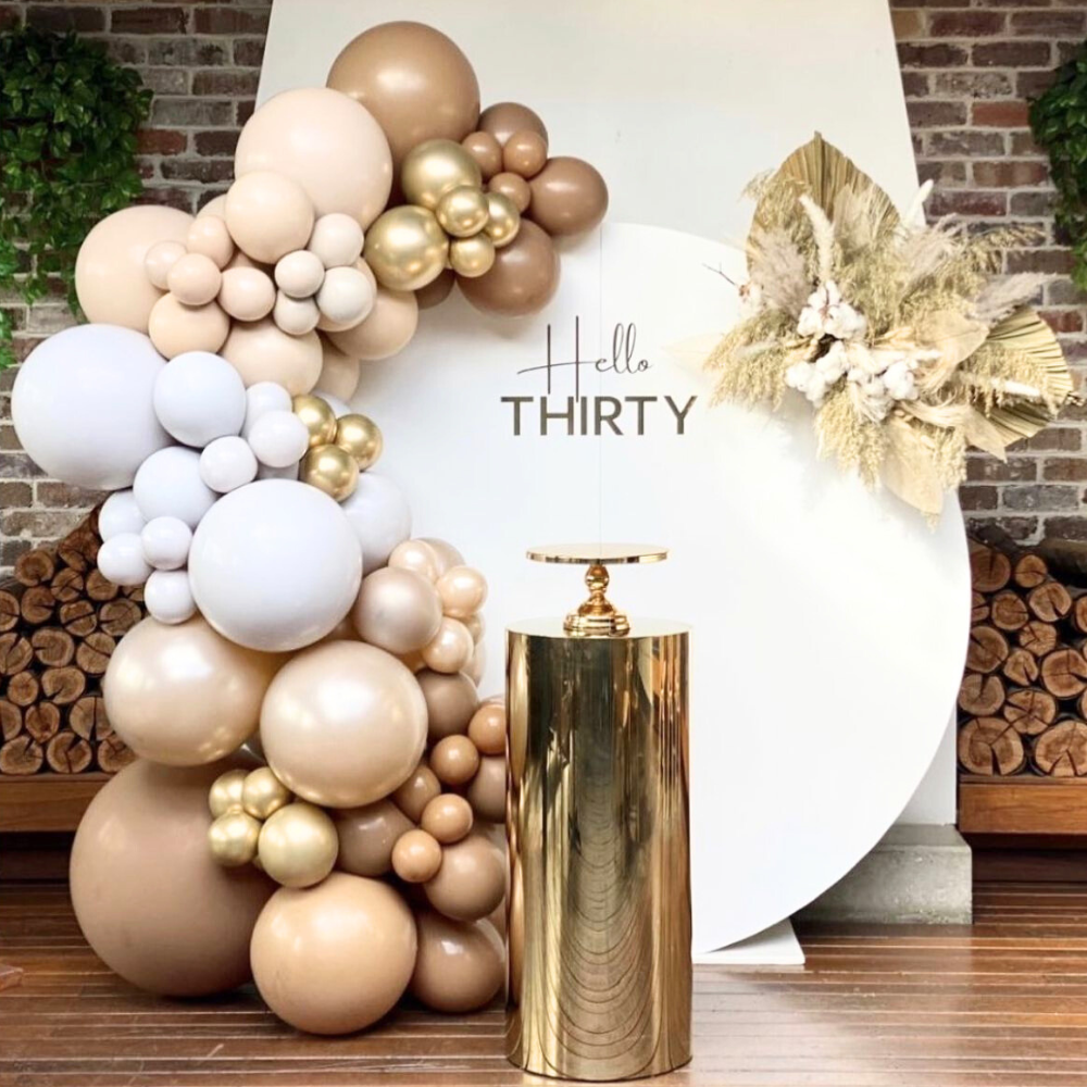 Round Wood with Gold Podium Balloon Backdrop featuring a decorative balloon arrangement, ideal for parties and events, with a customizable option for personalizing.