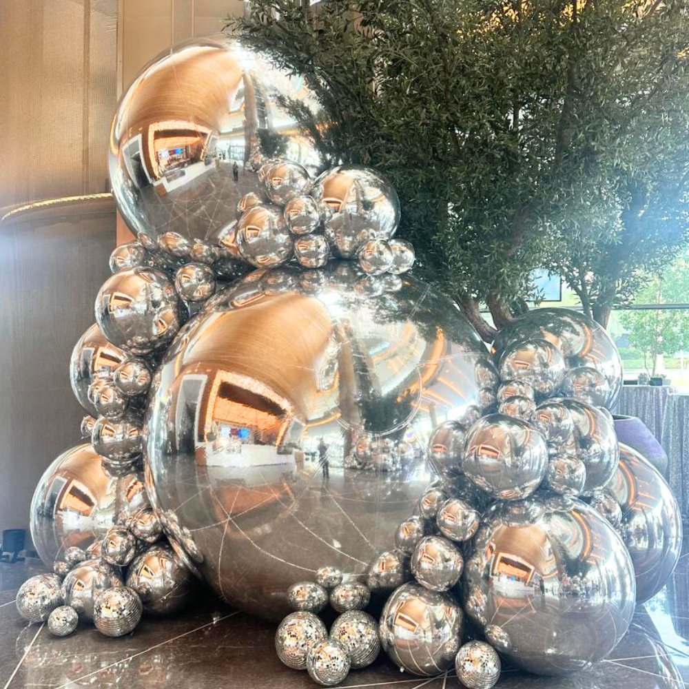 Silver Mirror Inflatable Balls crafted from quality PVC, perfect for adding unique flair to events. Available in various sizes, ideal for decorative purposes.