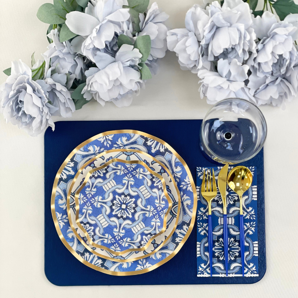 A set of Moroccan Nights paper salad &amp; dessert plates with metallic gold ruffled edges and a Moroccan tile-inspired pattern, perfect for adding elegance to events.