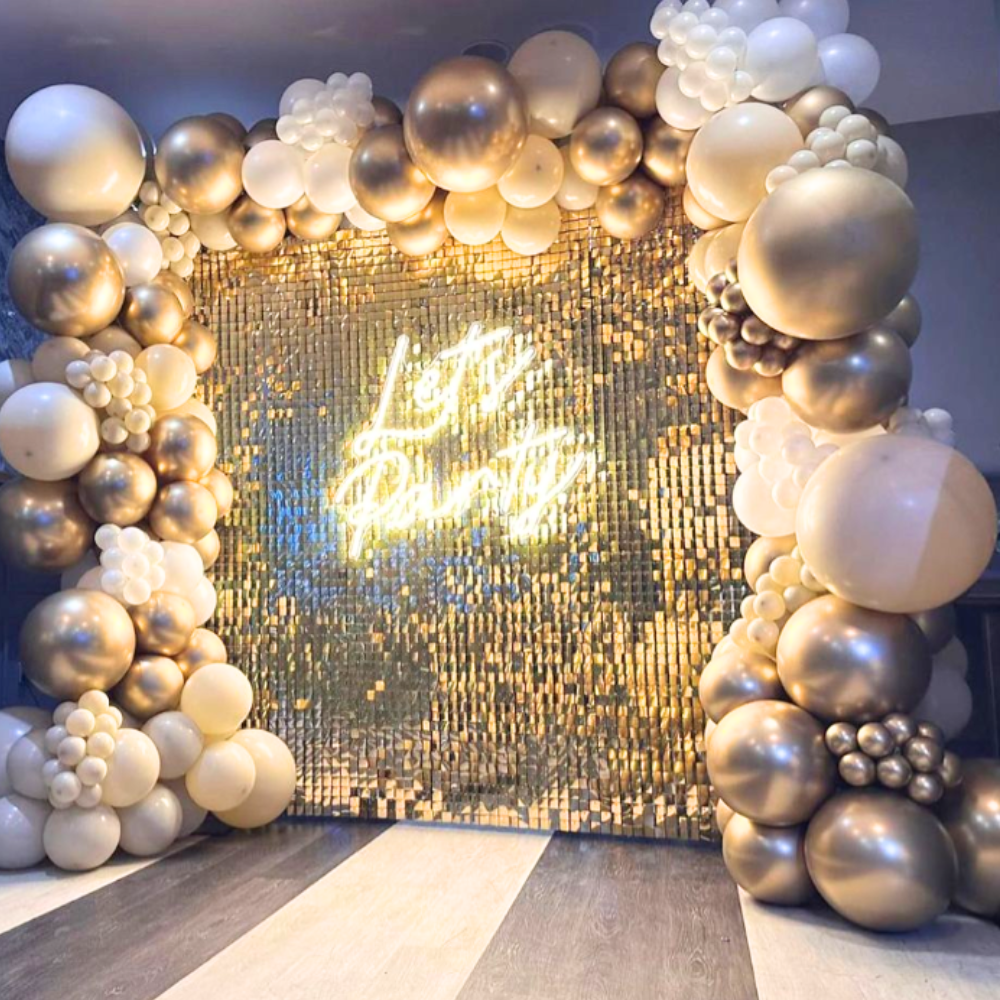 Gold Sequin Wall Balloon Backdrop with LED Neon Sign, featuring customizable balloon decorations for elegant events like weddings and parties.