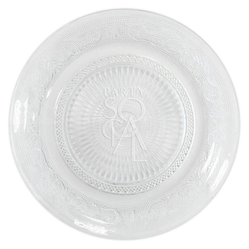 Vintage clear glass plate featuring an engraved design, ideal for enhancing elegant table settings at events or gatherings.