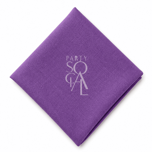 A square Violet linen napkin displayed diagonally on a clean white background.