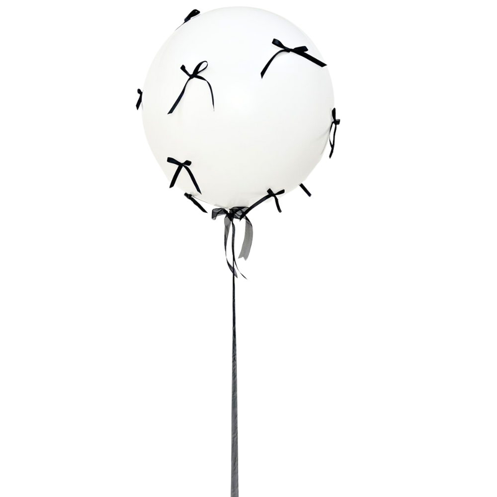 Bows Helium Giant Balloon with black bows and a handmade ribbon tail, ideal for enhancing party celebrations with style and fun.