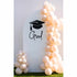 Sweet Soirée Balloon Arrangement featuring a white arch backdrop with Grad text and cream balloon garland, perfect for elevating graduation celebrations.