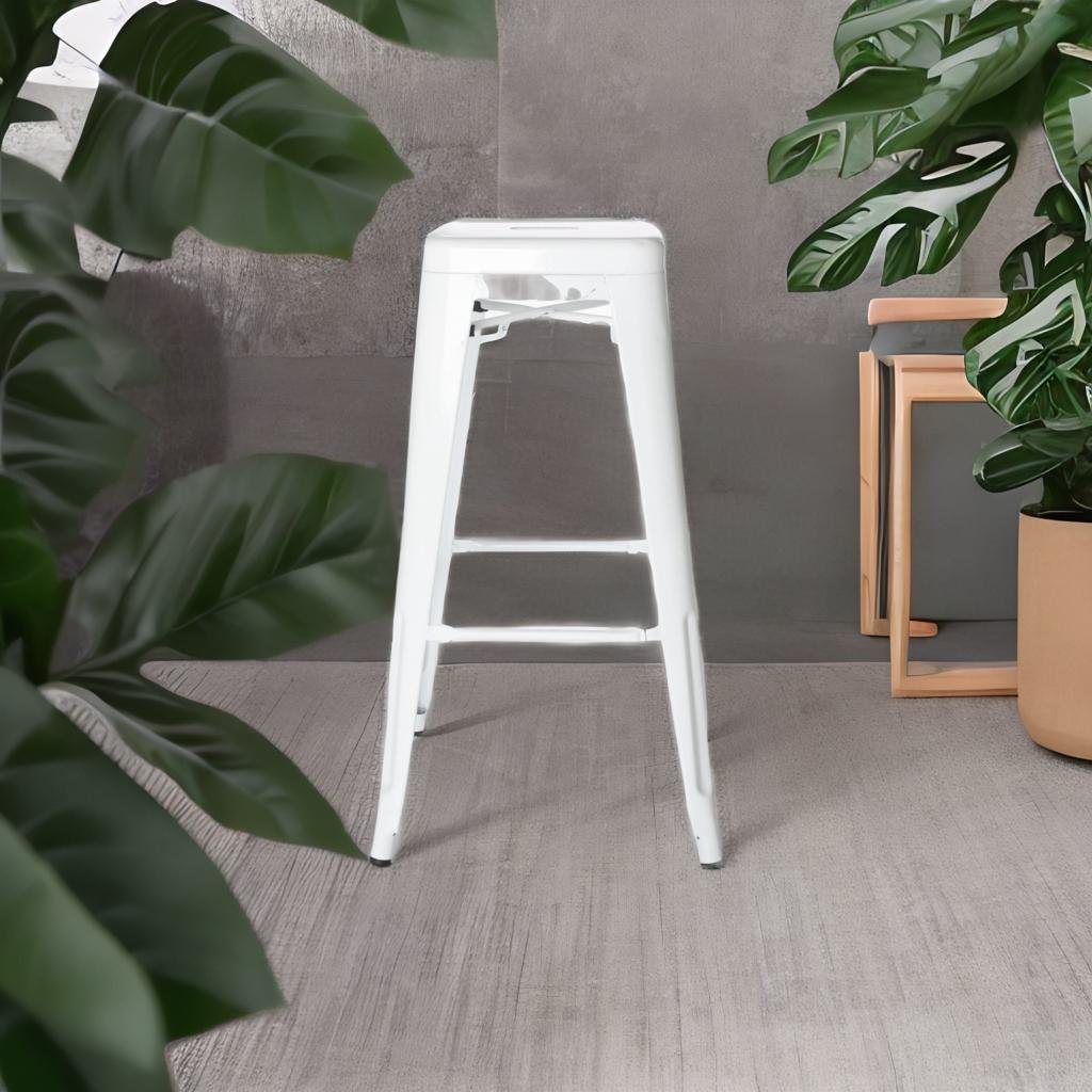 White Metal Bar Stool in a room with plants, ideal for events or home use, reflecting Party Social&