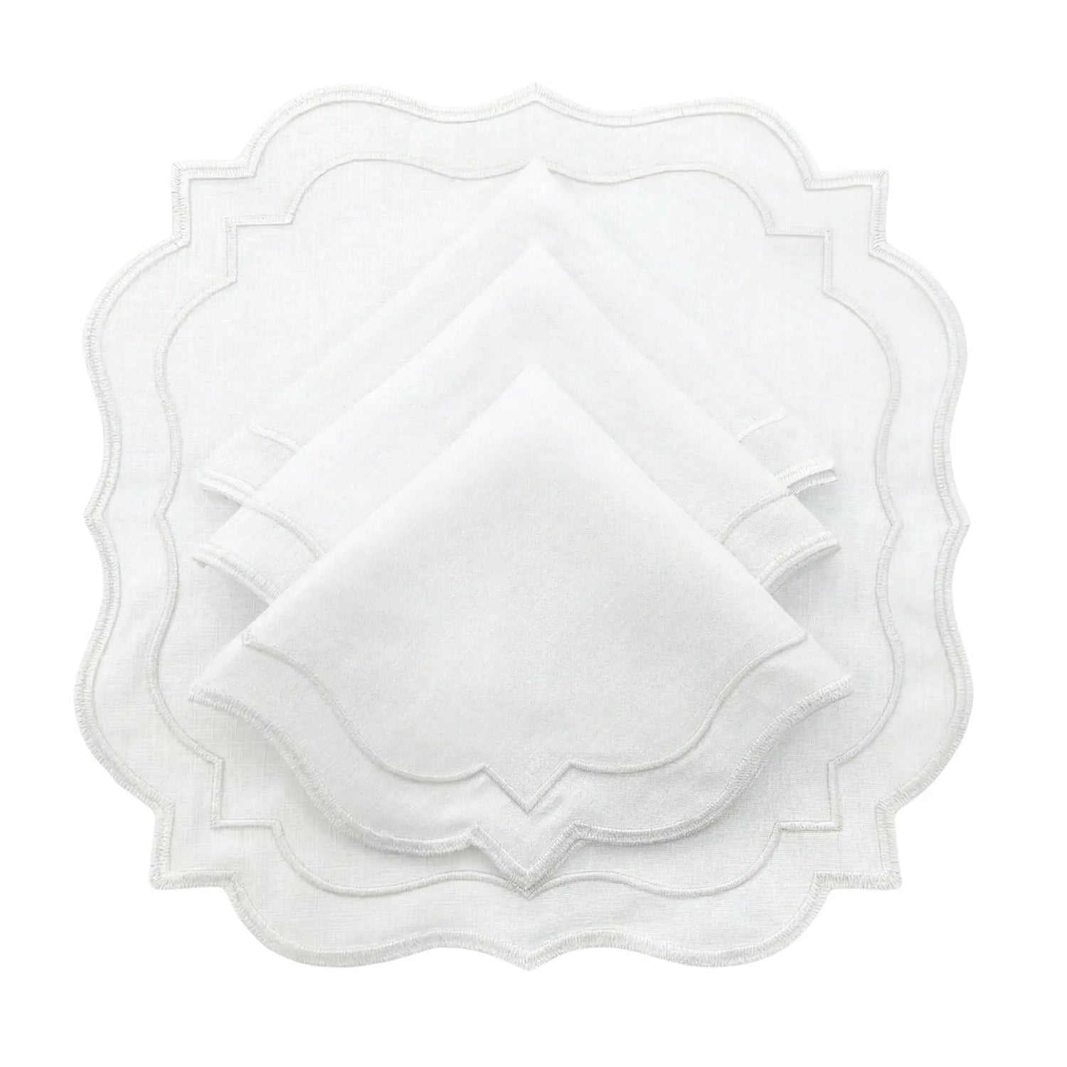 White Scalloped Linen Napkins - Set of 4, featuring elegant scalloped edges with silver embroidery, ideal for sophisticated dining and special occasions.