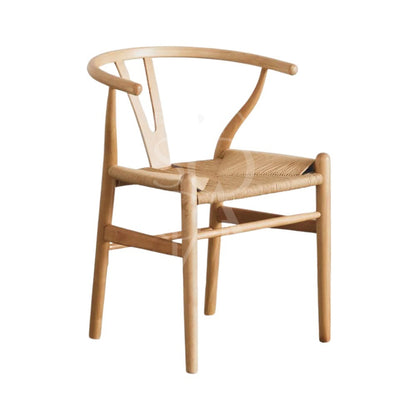 Wishbone Chair with a woven seat, ideal for modern, minimalist event settings, available through Party Social for elevating any occasion.