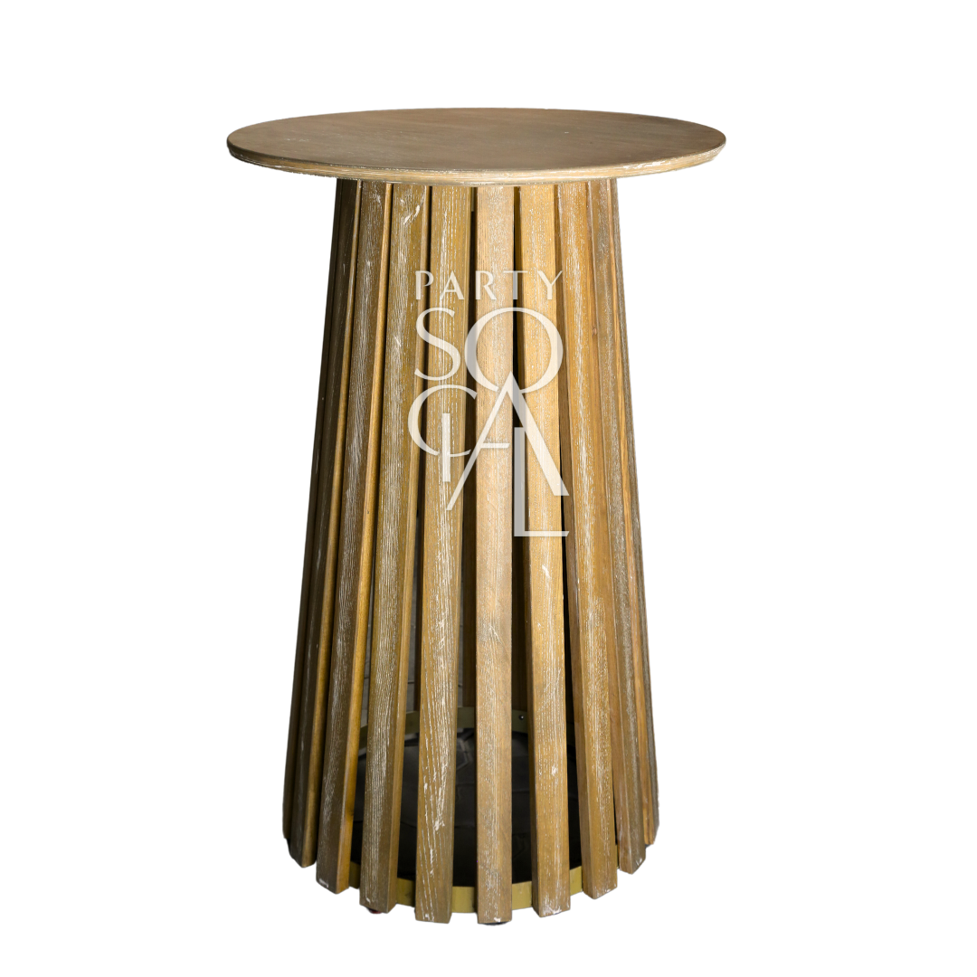 WOODEN COCKTAIL TABLE: A round wooden table with a smooth, round top, ideal for garden or home settings as part of the Party Social collection.