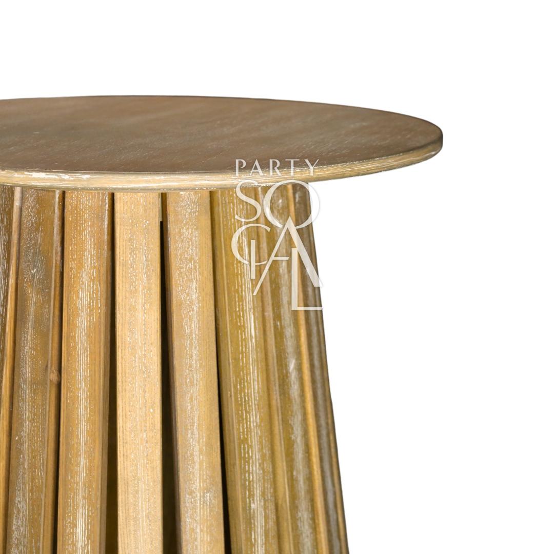 WOODEN COCKTAIL TABLE in close-up, showcasing its elegant wooden surface, perfect for both indoor and outdoor event settings. Ideal for complementing other wooden furniture.