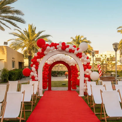 Wooden U-Shaped Backdrop set against a red carpet aisle, framed by balloon-decorated arches, ideal for event entrances or photo-ops.