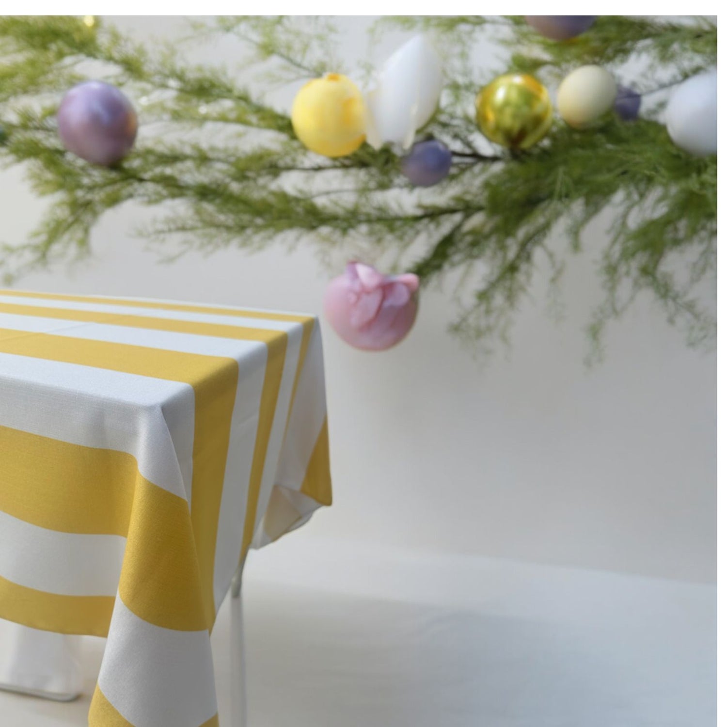 Yellow Stripe Linen Tablecloth elevates your table setting with a premium touch. Perfect for events and dinners, this reusable polyester tablecloth in various sizes enhances any occasion. From Party Social, your go-to for party essentials.