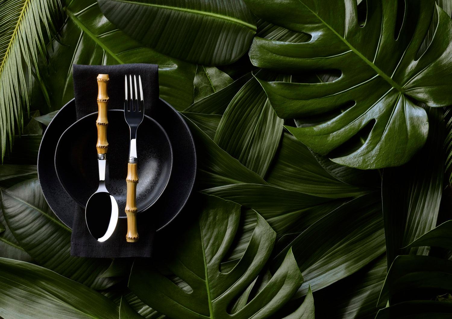 Bamboo Light Cutlery Set of 5 on a leaf
