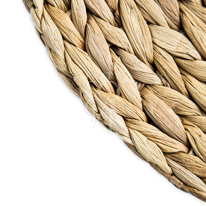 CANE PLACEMAT: Close-up of a woven basket-like texture, highlighting the intricate braided cane pattern, ideal for enhancing any table setting.