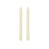 Two slim cream-colored taper candles standing upright side by side on a plain white background.